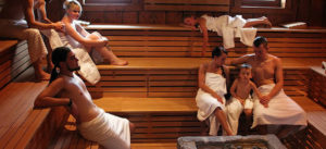 people gathering in sauna room