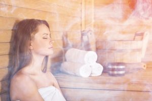 A women is enjoying steam shower