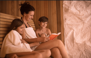 A mother is enjoying showering with her kids